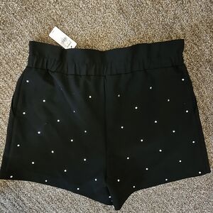 Black paperback shorts with rhinestones.